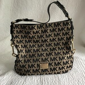 Michael Kors purse.  Animal and smoke free home