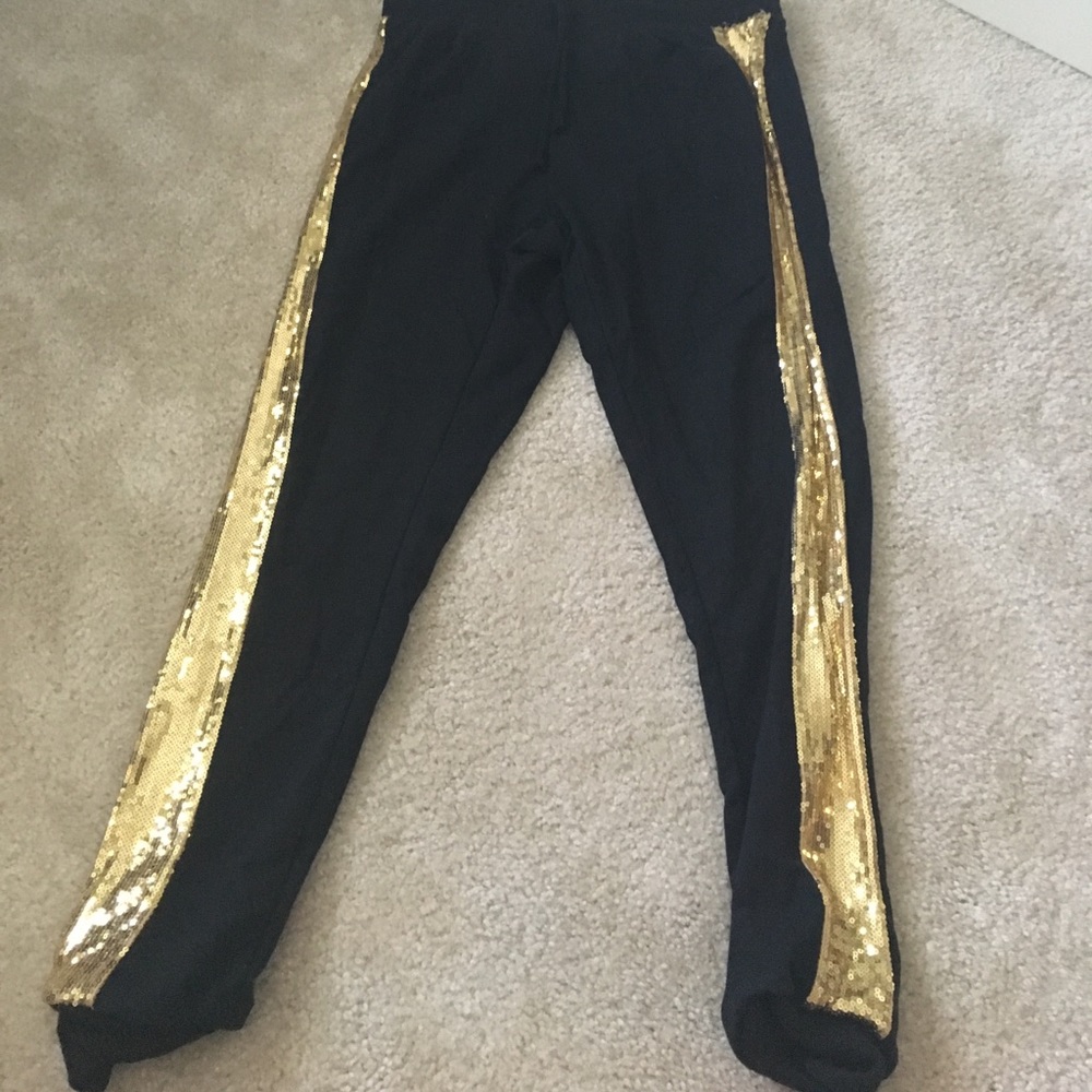 Black joggers with gold stripe