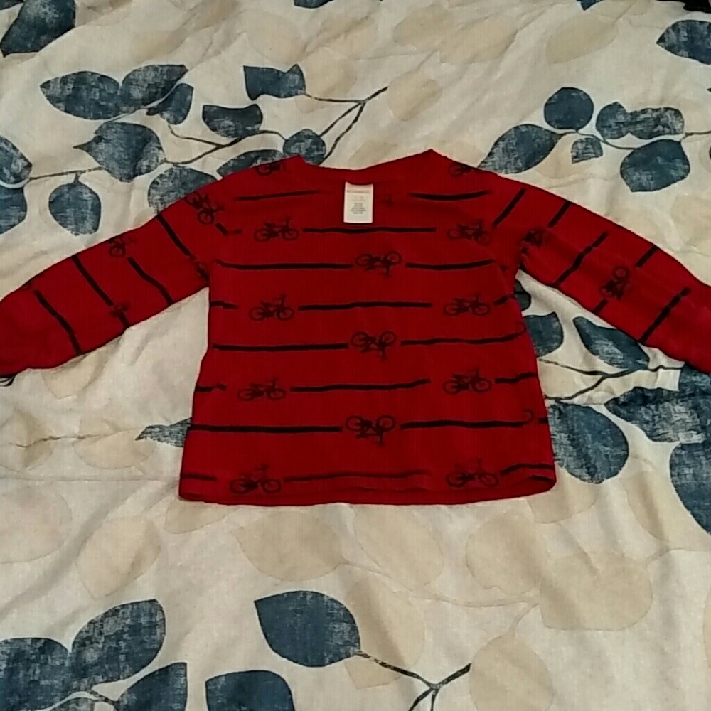 Red and navy long sleeve shirt with bicycles.