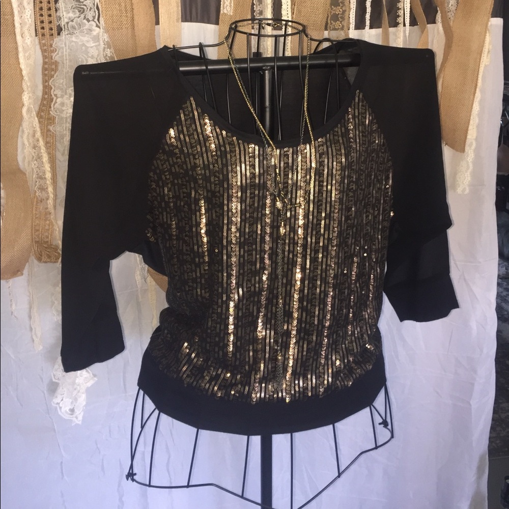 Express black with gold sequin top