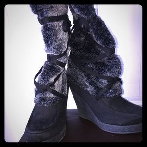 Fur boots with a wedge heel