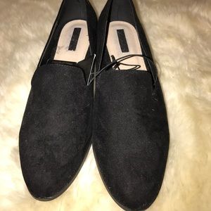 Black loafers with mini heel