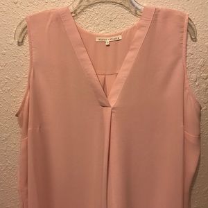 Sleeveless light pink blouse