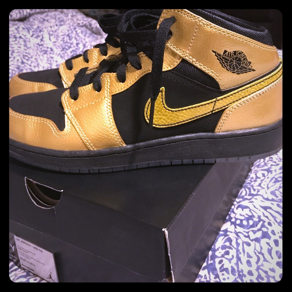 Youth metallic gold and black Jordan's