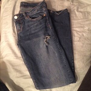 Dark blue ripped jeans