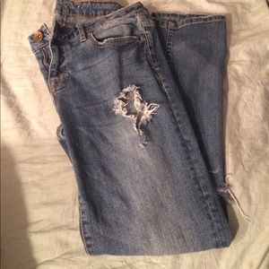 Light blue , ripped jeans