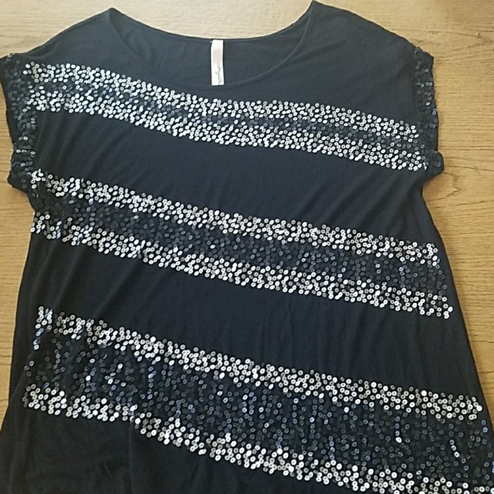 Super cute black sequined top.