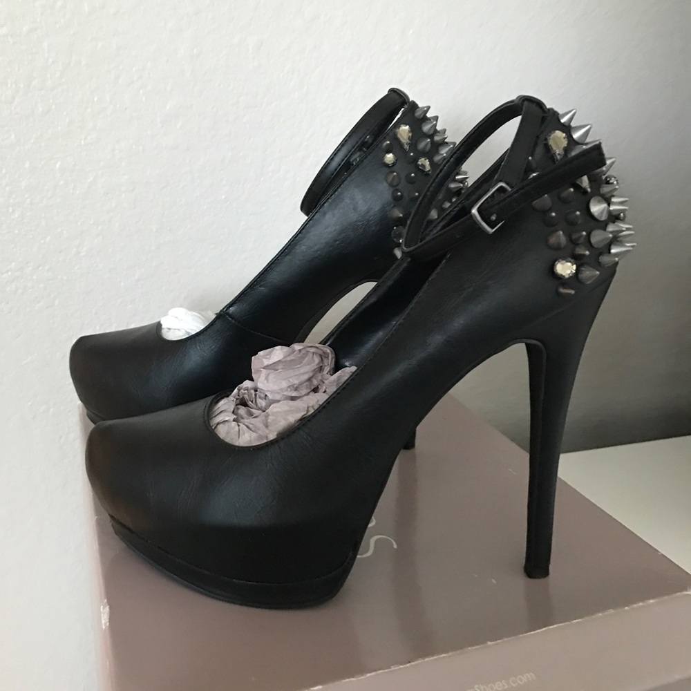 Spiked black heels