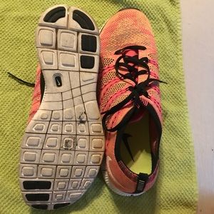 Multi colored gently used Nike sneakers.