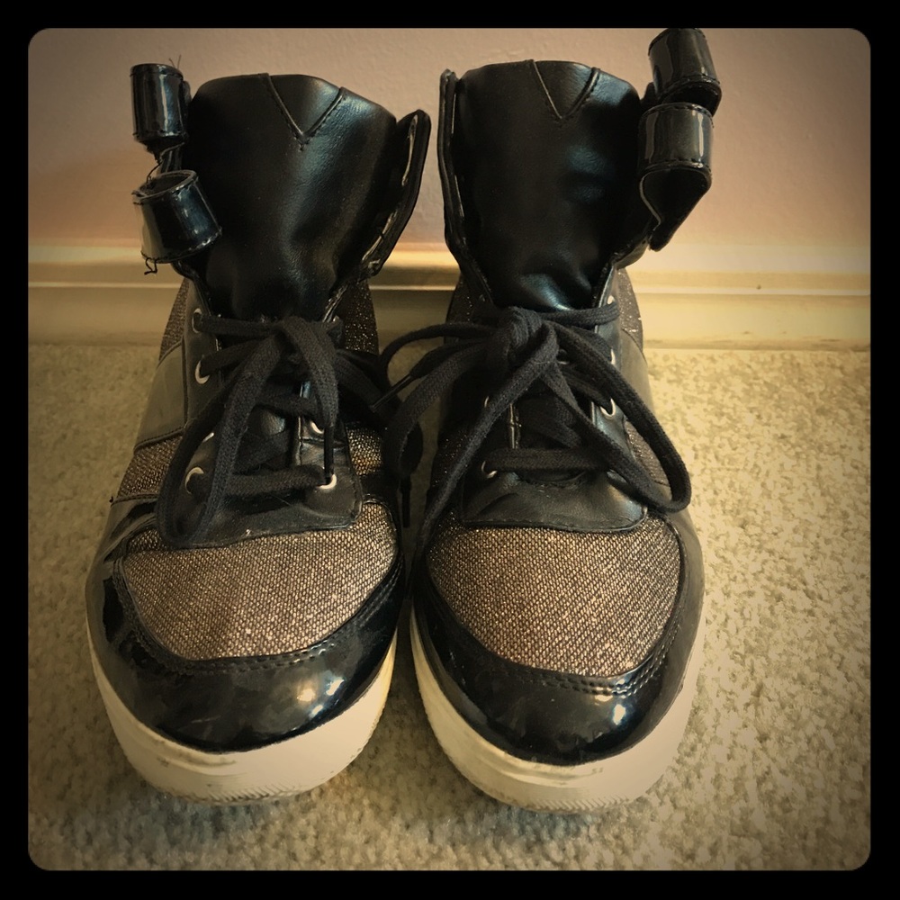 Black and gold high top sneakers