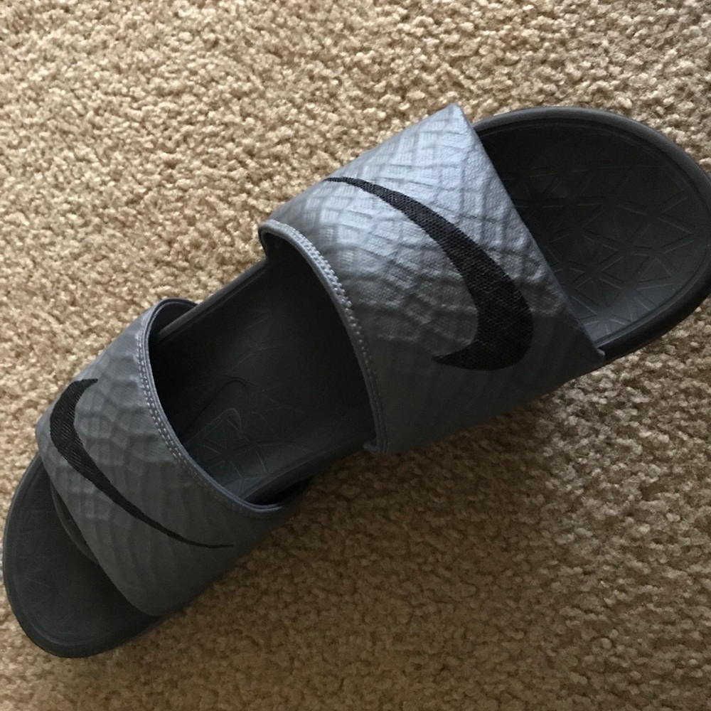 grey nike slides