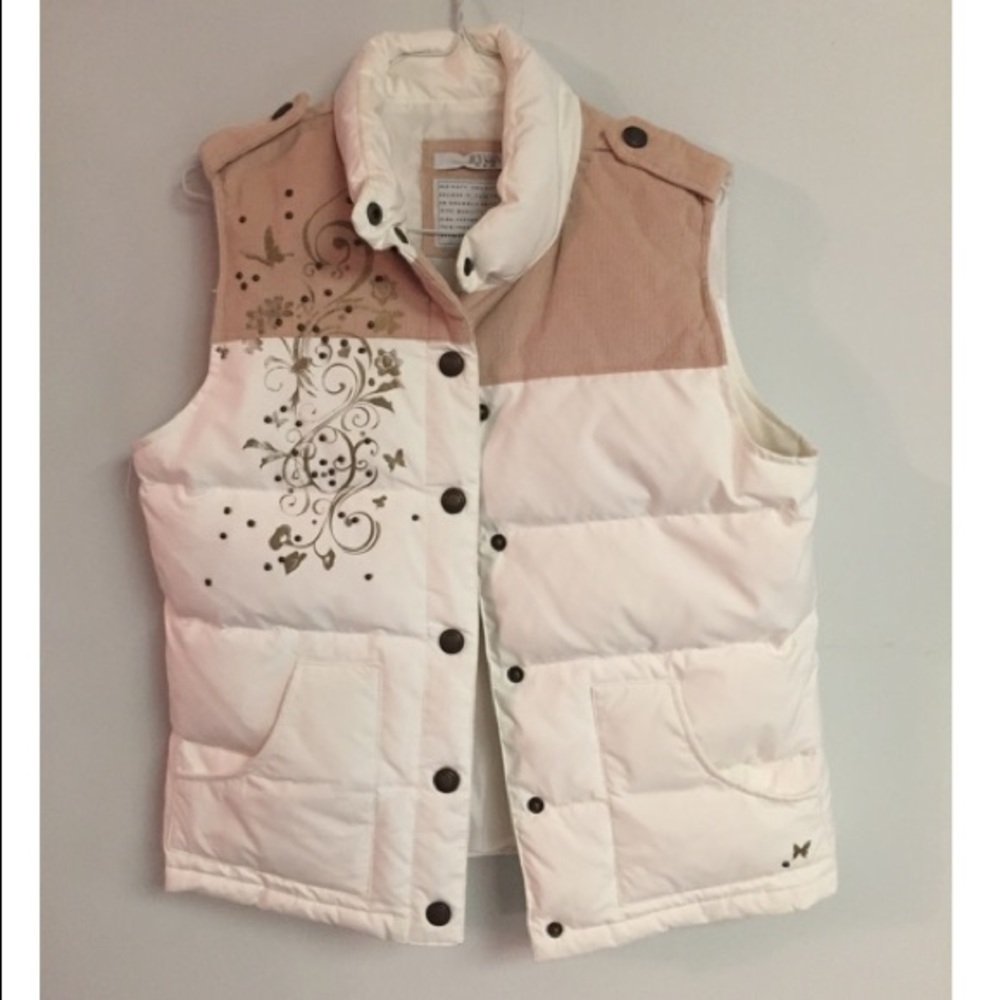 Tan and off-white winter vest.