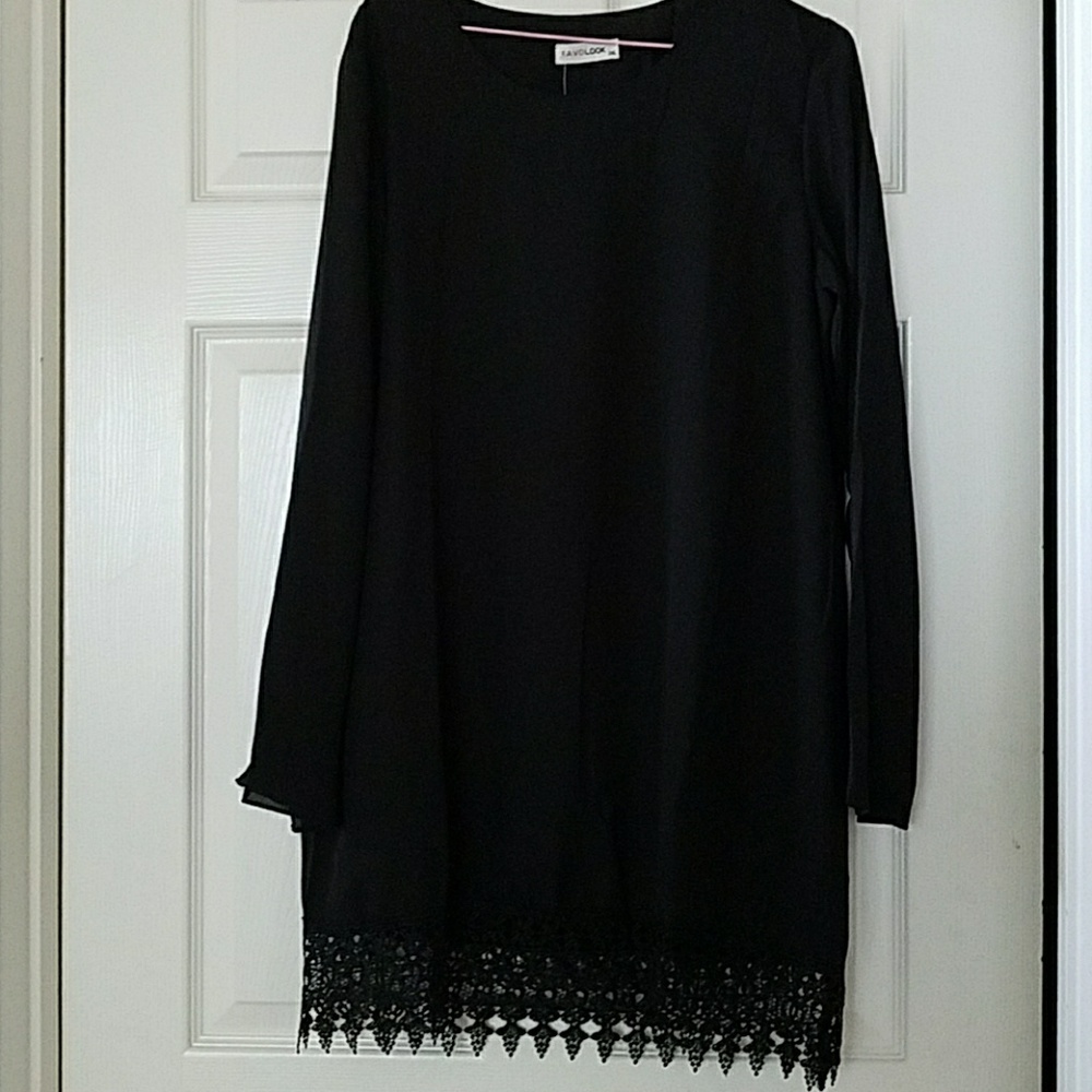 Black long sleeve dress with laced bottom trim