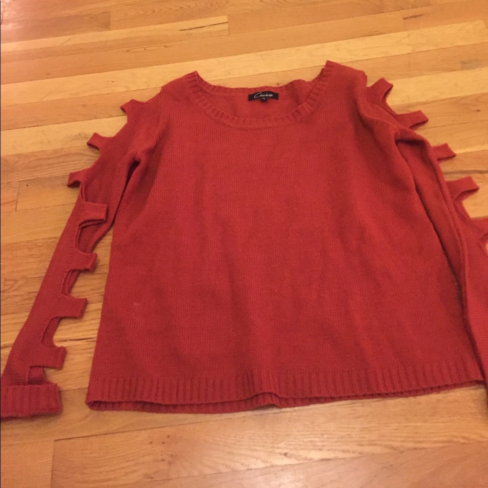 Sweater with arm slits
