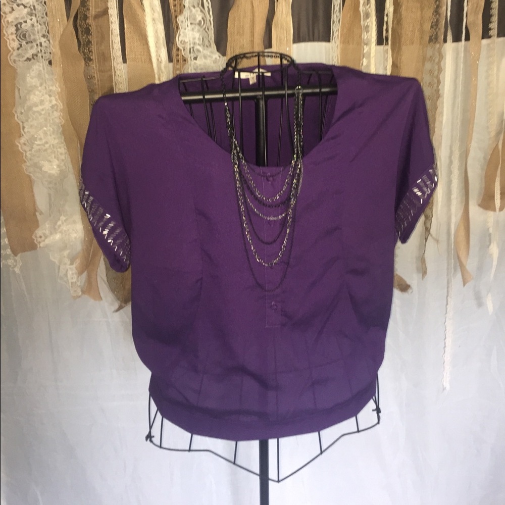 Fun and flirty Francesca's beaded purple top
