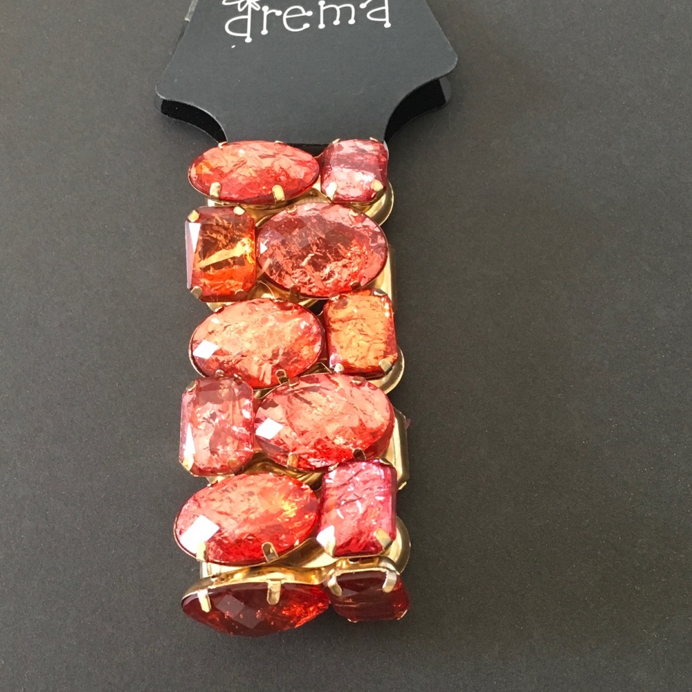 Rose and peach colored fashion bracelet .