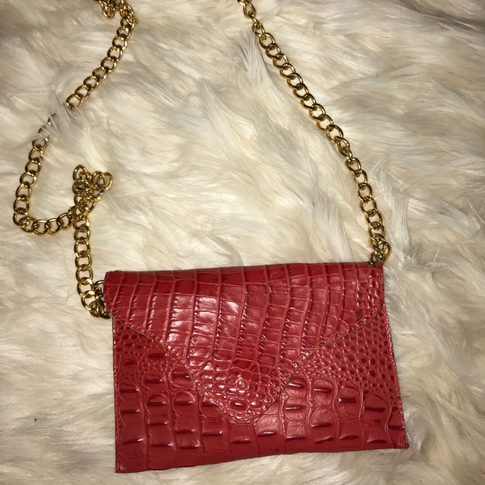 Red snake skin never been used JJ Winters purse
