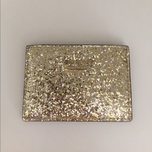 Kate Spade gold and silver glitter card holder