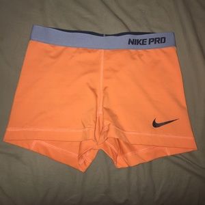 Orange Nike pro spandex