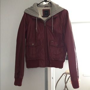 Obey leather jacket with attached grey hoodie.