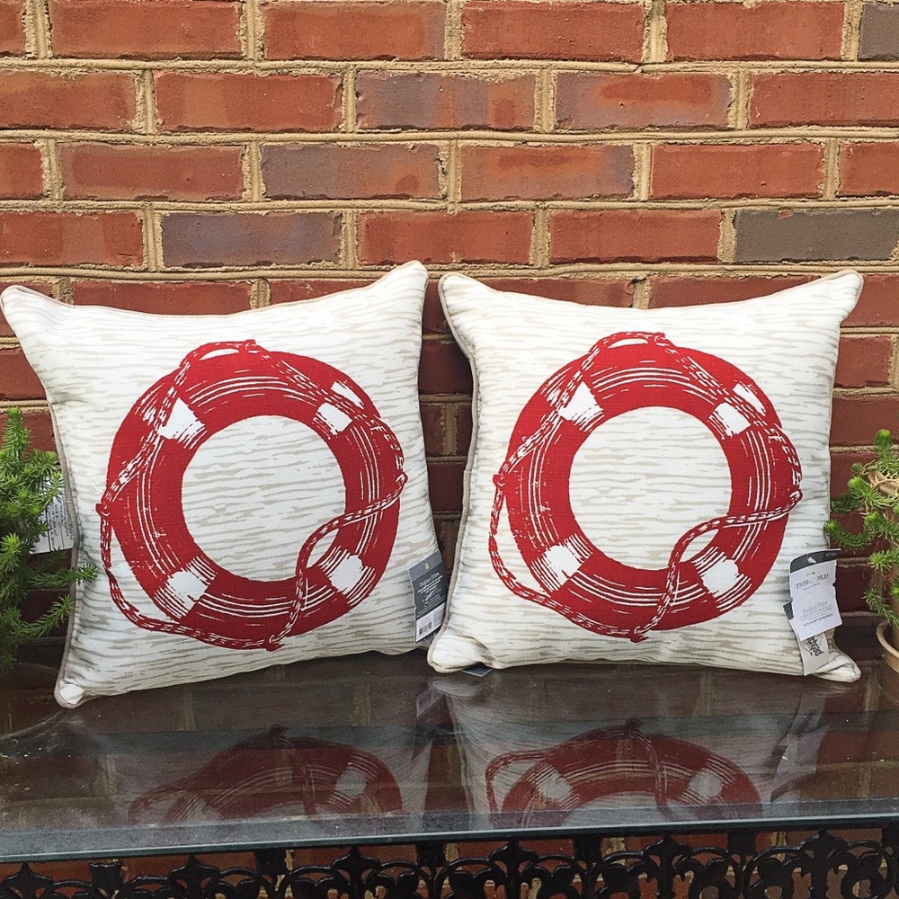 Two Red 'Lifesaver' Outdoor Pillows