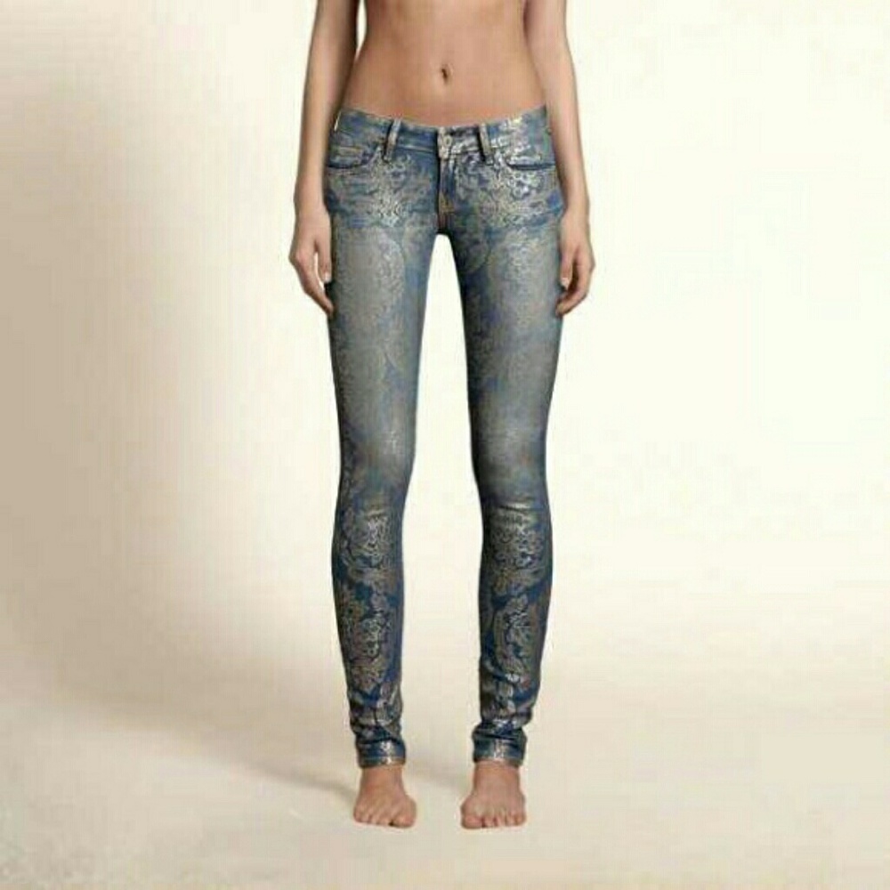Hollister super  skinny jeans with gold print.