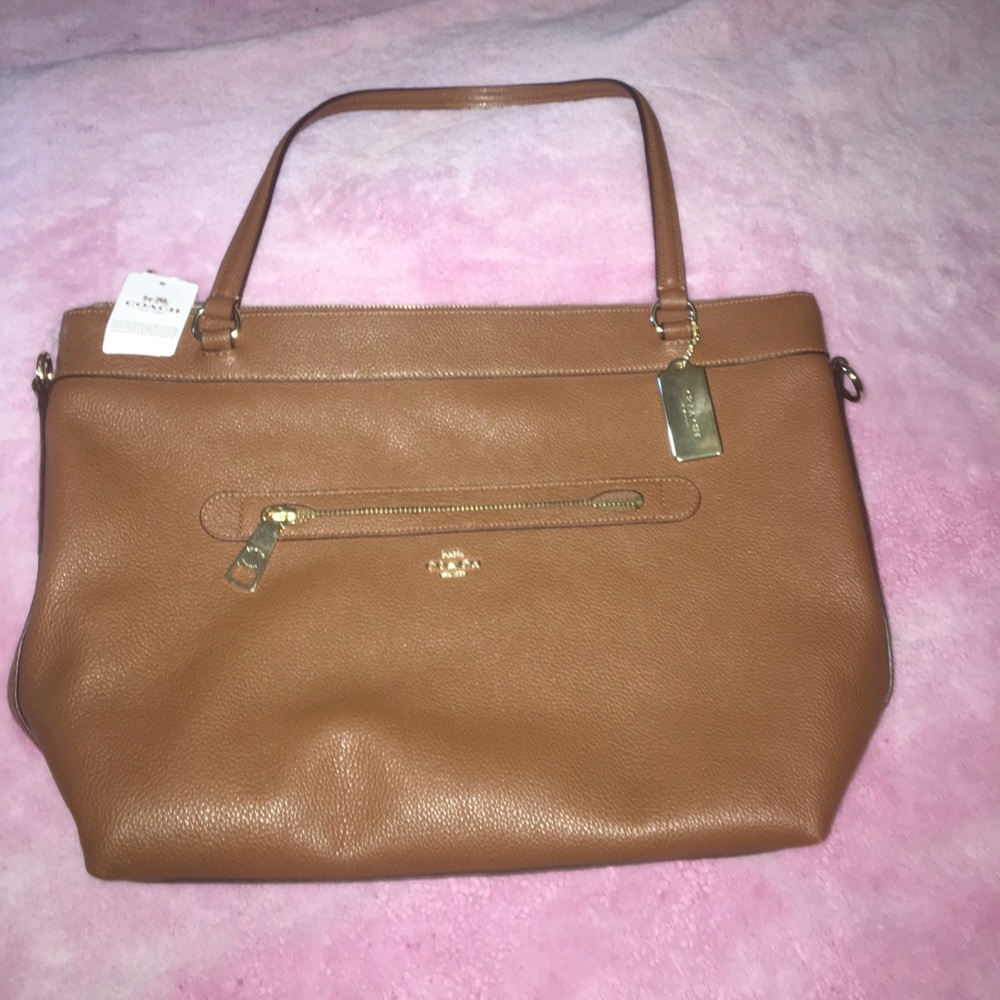 NWT. Saddle brown coach purse with gold hardware