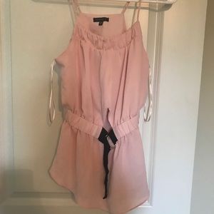 Pink & black blouse.