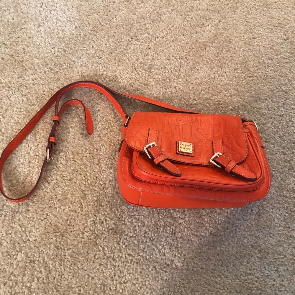Orange embossed Dooney and Burke crossbody