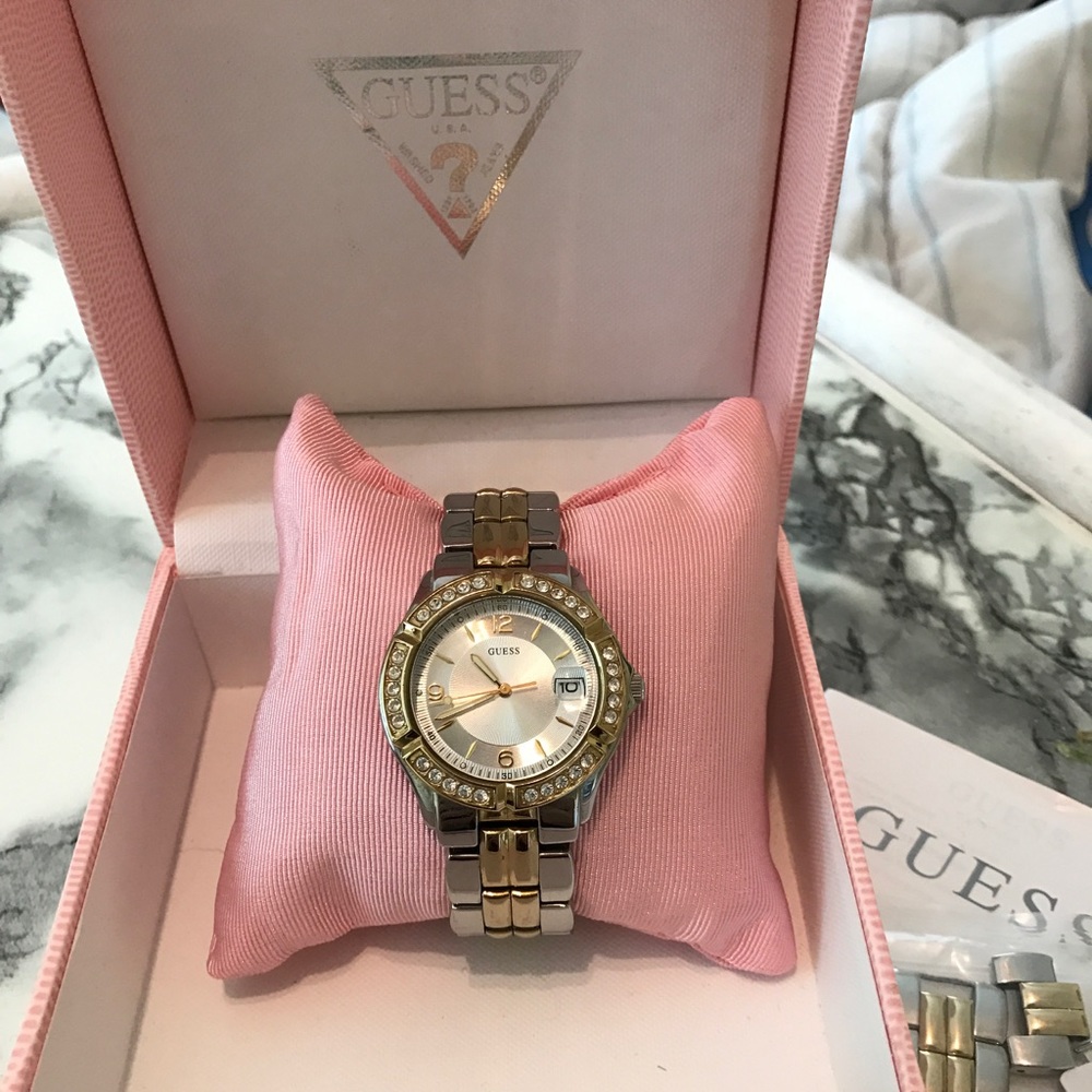 Silver and gold Guess watch