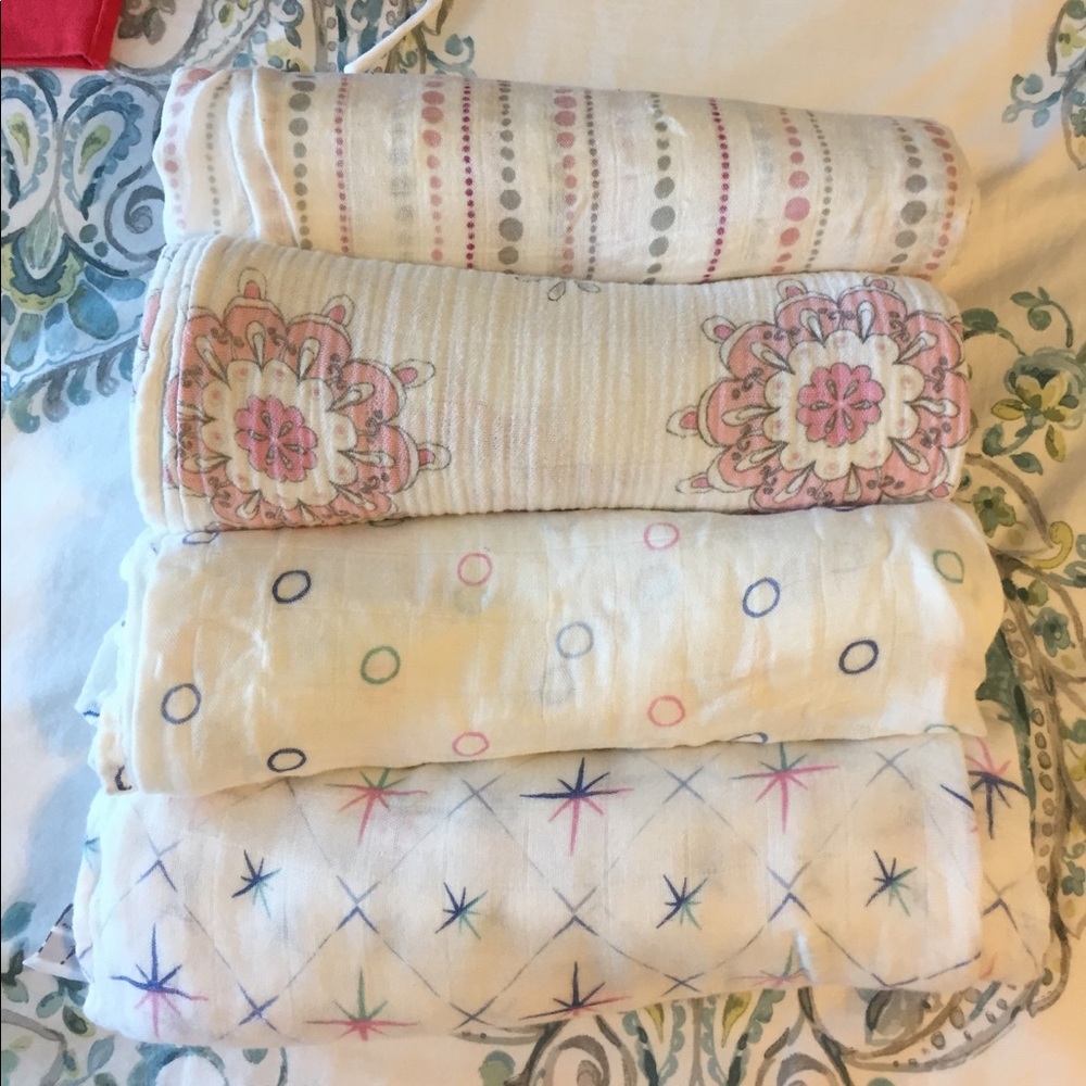 Four aden + anais swaddle blankets. 3 are bamboo.