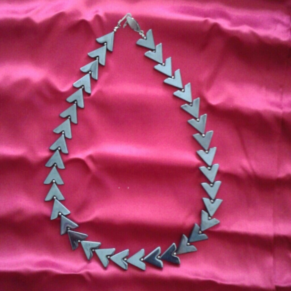 Unusual black arrow necklace.