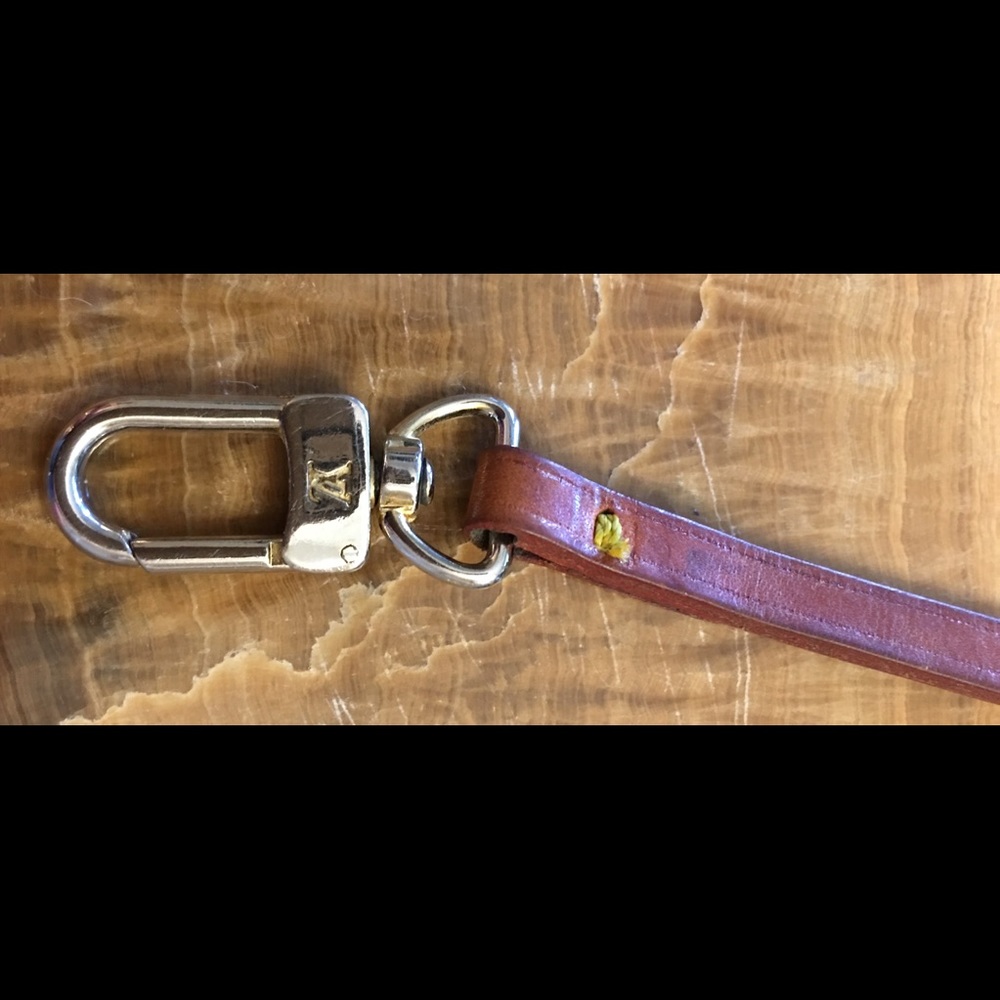 Louis Vuitton leather clasp