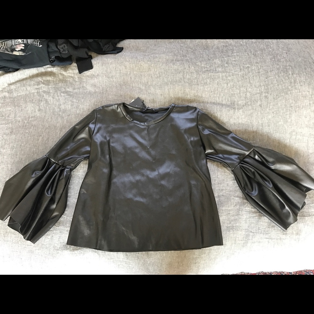 Leather like too with ruffle detail