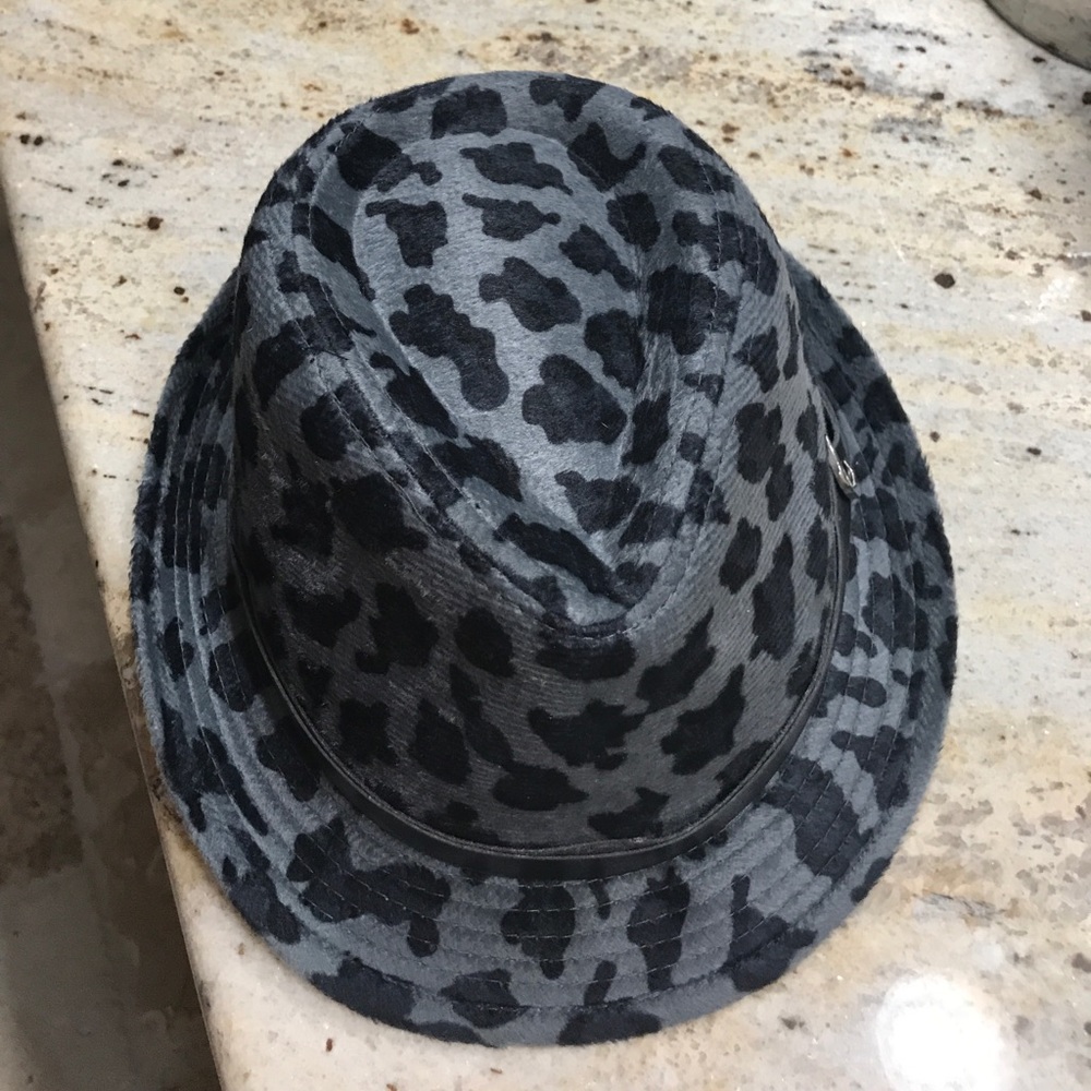Black and gray fedora hat;