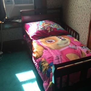 Toddler bed w/ mattress and bed sheets. Never used