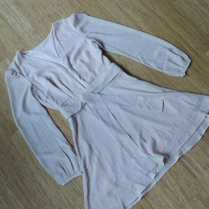 Blush mini dress with deep v-neck