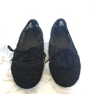 Woman's Black Lacey Flats