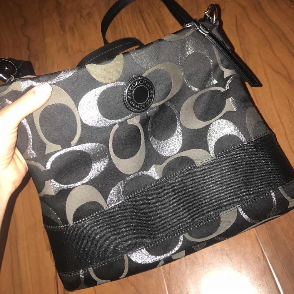 Cross body black and silver coach purse