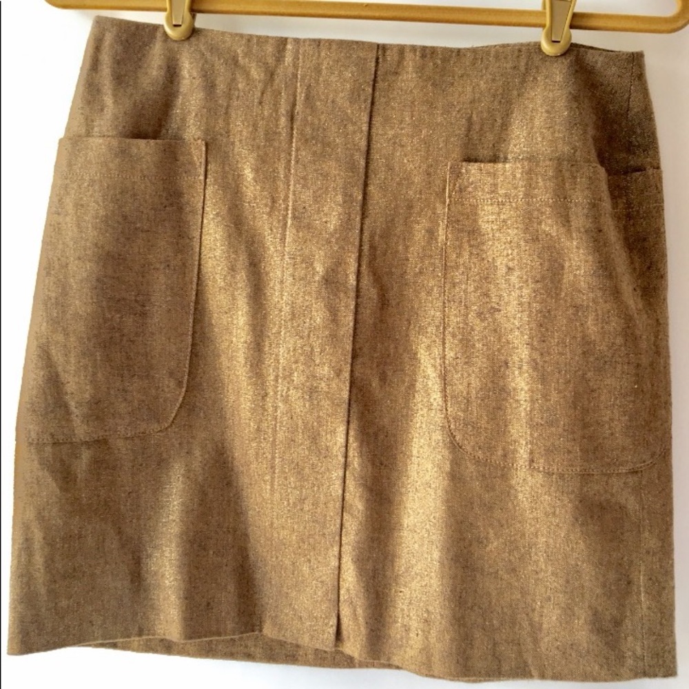 Miniskirt with metallic golden tones