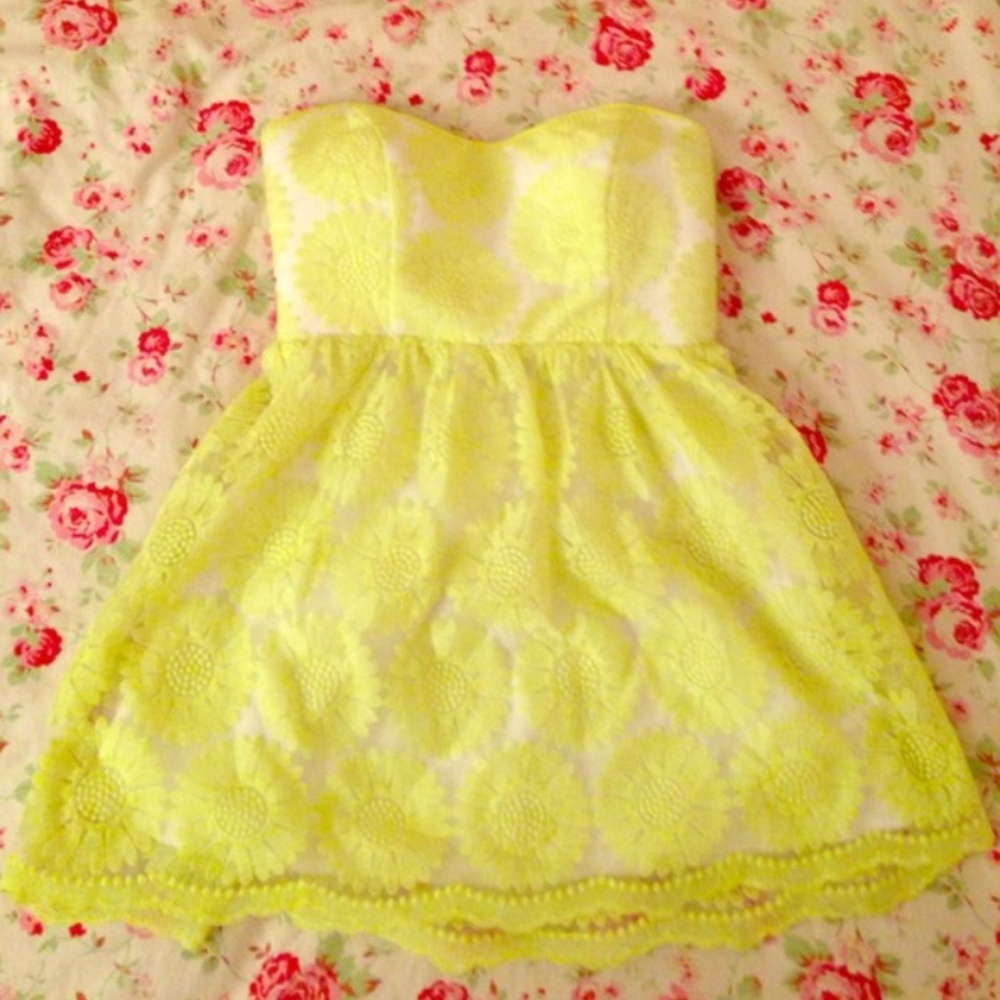 Yellow strapless lace dress