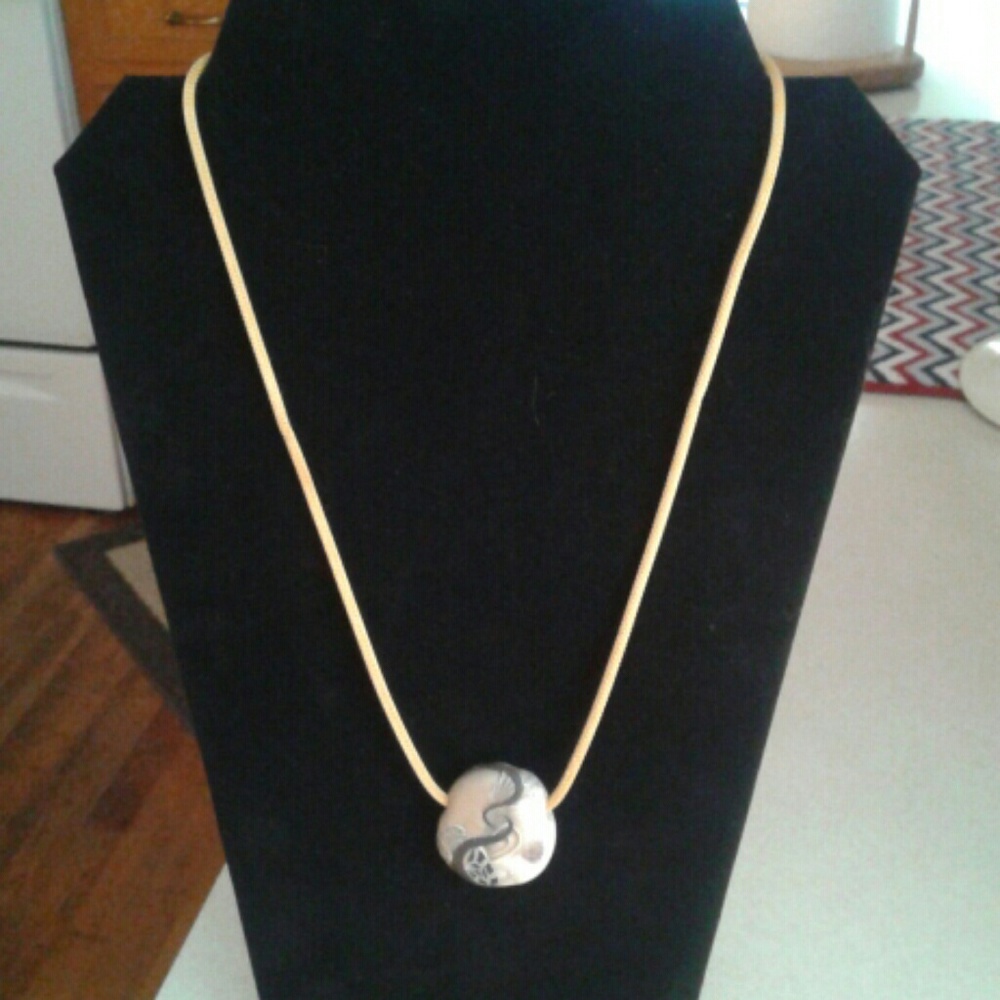 Gold roped pendant necklace