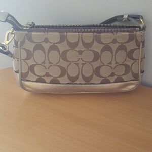 Small gold coach bag