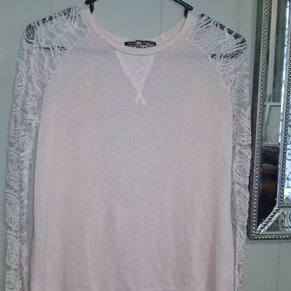 Alkost famous long sleeve lace top.