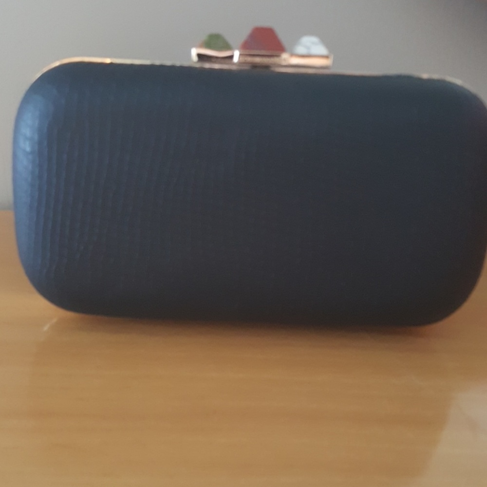 NEW BCBG MAXAZRIA black textured leather clutch