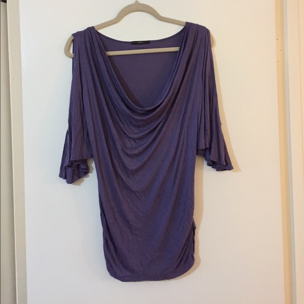 Purple shirt, pretty flutter sleeves, cowl neck.