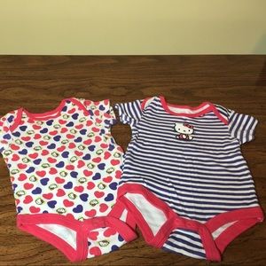 Two Hello Kitty onesies. Both 6 to 9 months