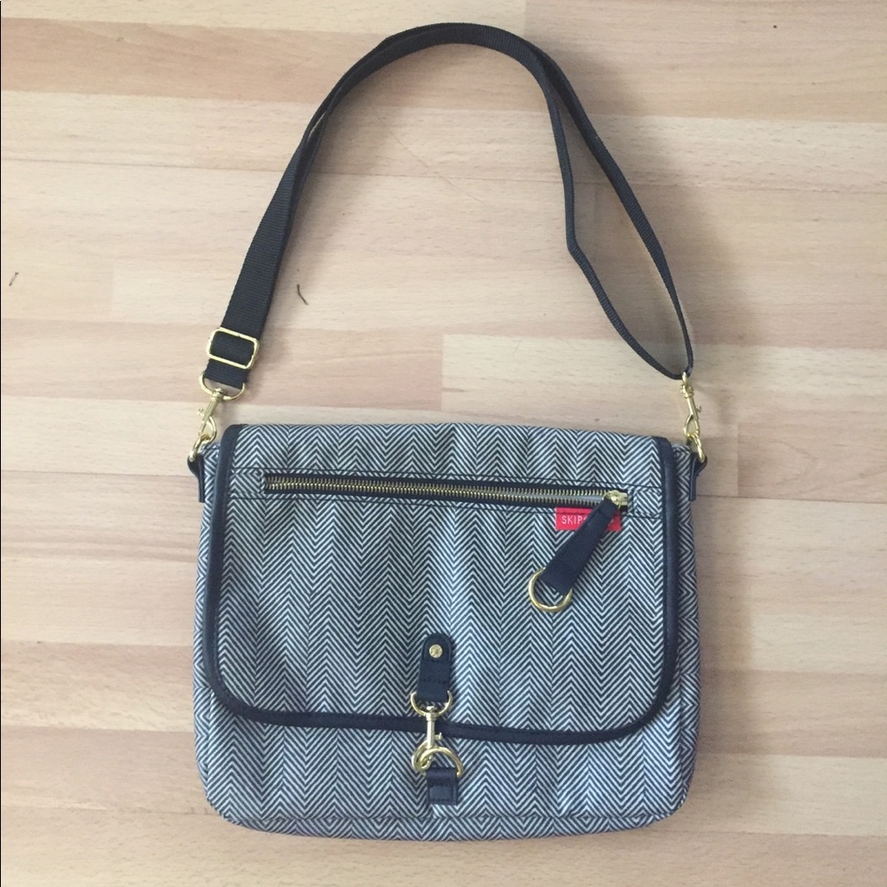SkipHop mini diaper clutch