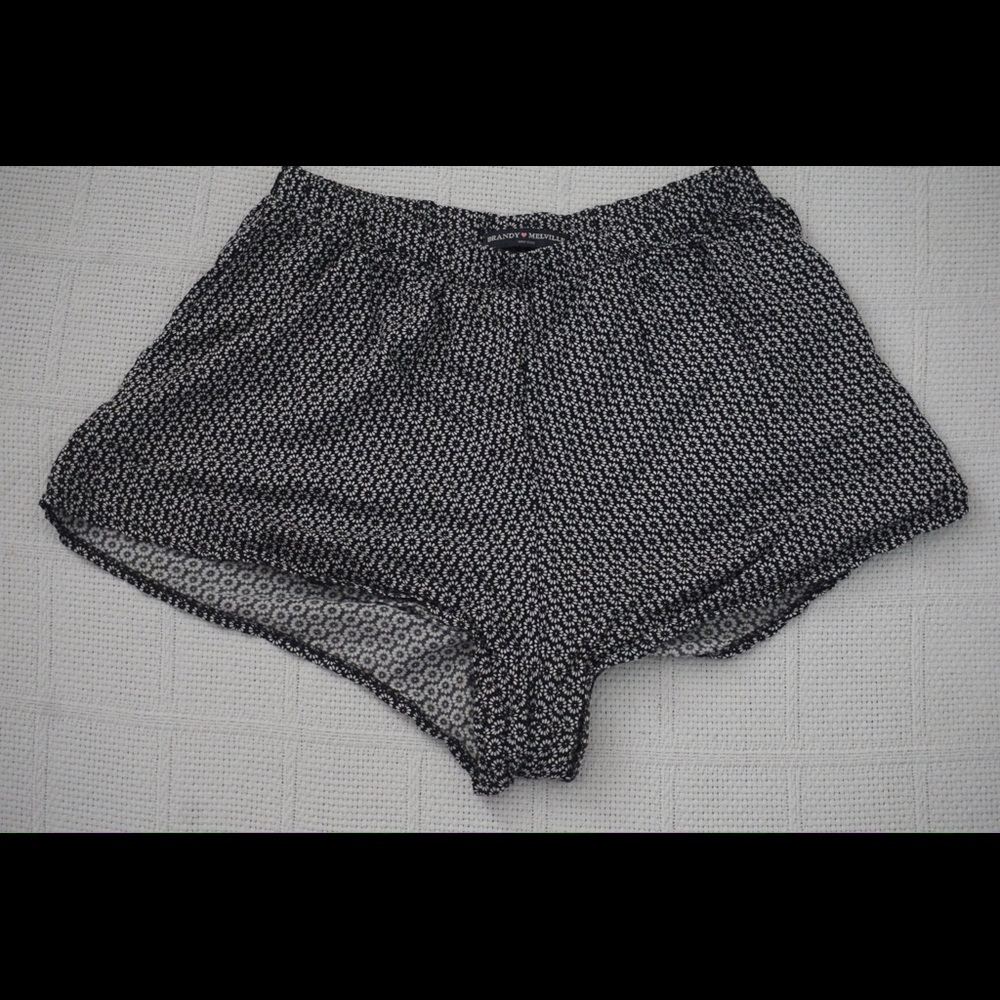 | BRANDY MELVILLE | black shorts w/ white daisies