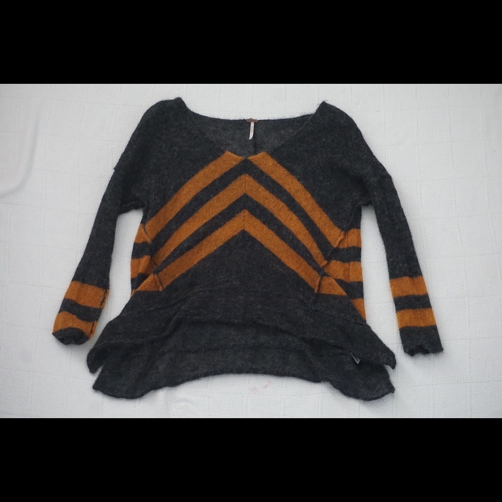 | FREE PEOPLE | orange and black wool sweater